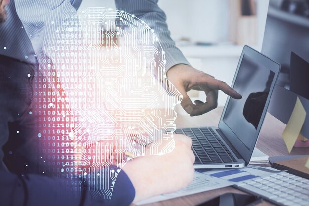 Man with computer background with brain theme hologram Concept of brainstorm Double exposure