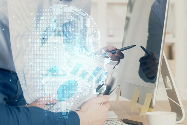 Man with computer background with brain theme hologram Concept of brainstorm Double exposure