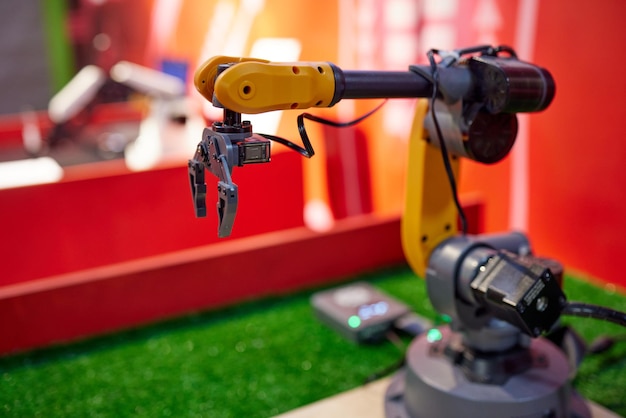 Mobile self-propelled robot. Mobile crawler robot with arm manipulator.
