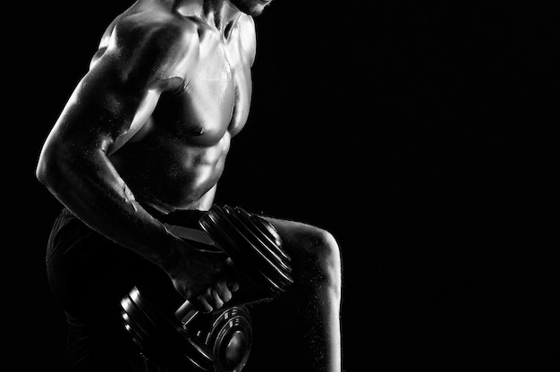Monochrome shot of an athletic ripped young sportsman