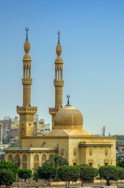 Mosque against clear blue sky