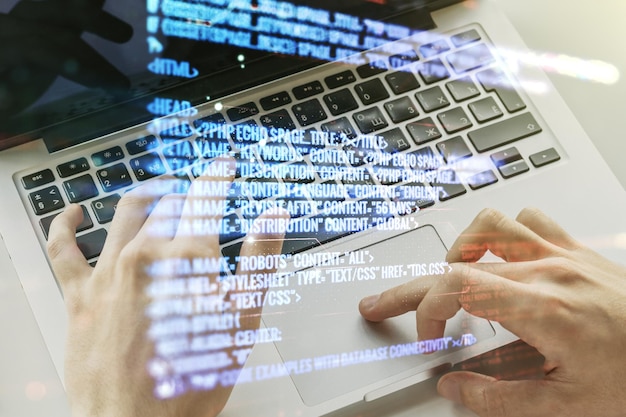 Multi exposure of abstract programming language hologram with hands typing on computer keyboard on background artificial intelligence and machine learning concept