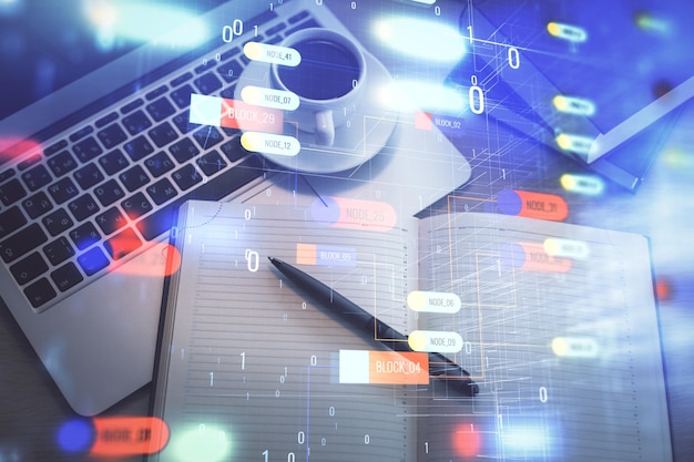 multi exposure of data theme drawing hologram over topview work desk background with computer concept of technology