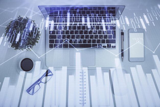 multi exposure of forex chart drawing over table background with computer concept of financial research and analysis top view