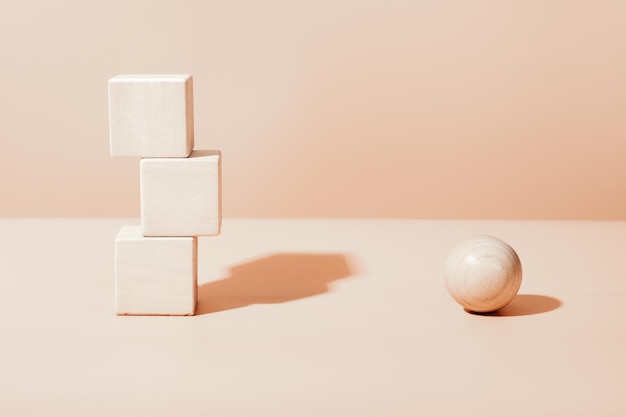 natural wooden cubes and ball neutral beige geometric details scene for product presentation