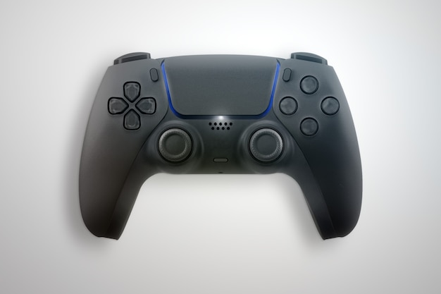 Next Generation black game controller isolated on white surface. Top view.