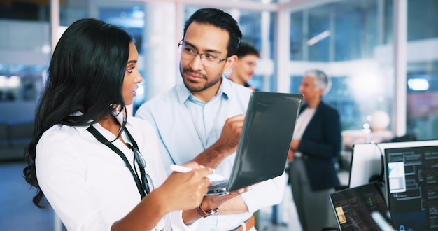 People developer and talk with laptop in office for programming coding training and check server Team mentor and helping with app testing IT intern and web application and troubleshooting system
