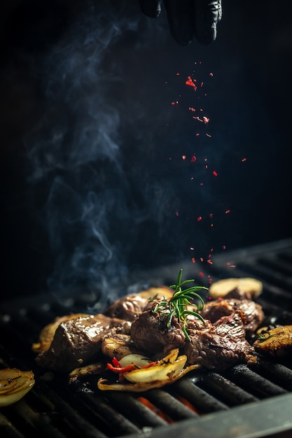 Pieces of beef steaks from grill