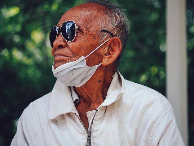 Portrait of man wearing mask