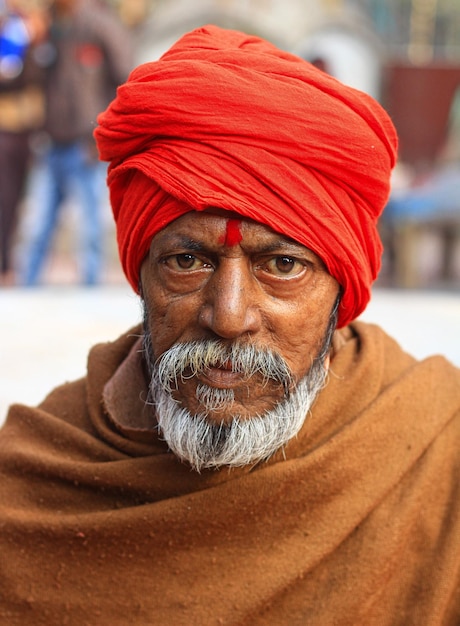 Portrait of man wearing red hat
