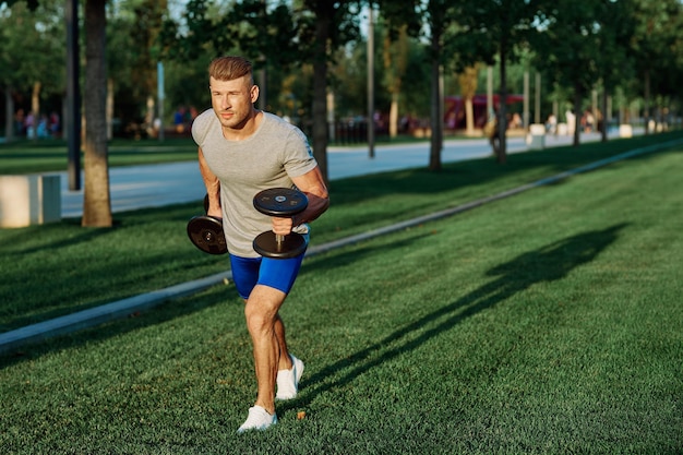 Portrait of young woman exercising on field