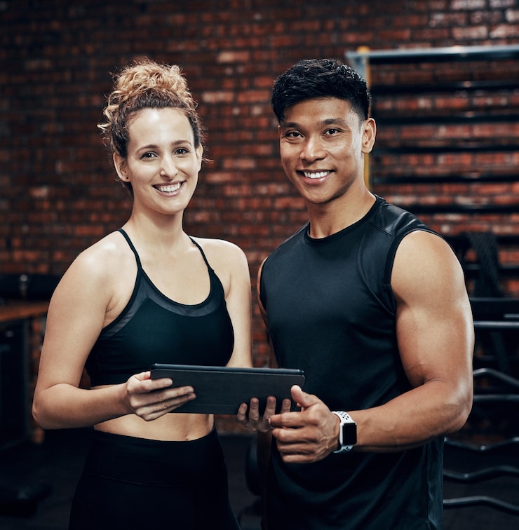 Foto portrait sign up and portrait of man with woman in gym together for exercise or fitness contract membership or welcome with happy personal trainer and client at health club for coaching schedule