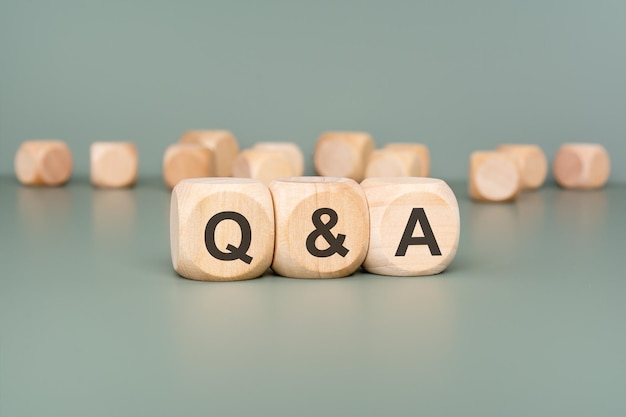 qa wooden blocks set against a stylish minimalist background for enhanced aesthetic appeal