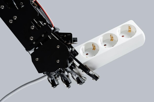 Real robotic hand with power strip Concepts of AI development