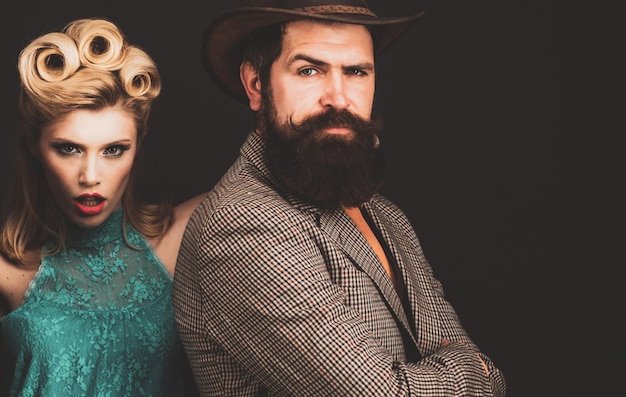 Retro couple over white background isolated vintage lovely couple old style welldressed retro couple
