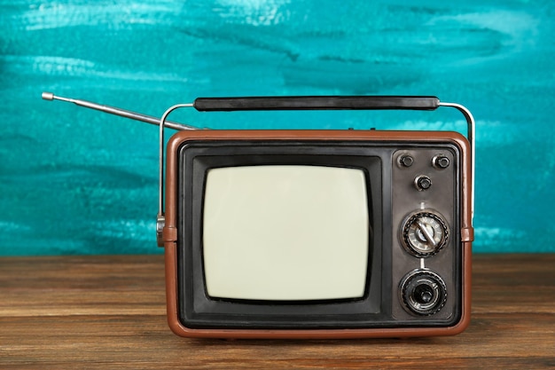 Retro TV on color background