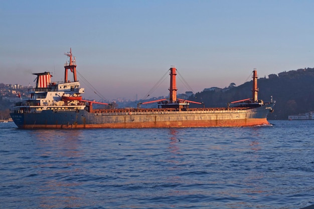 Ship on lake against clear sky