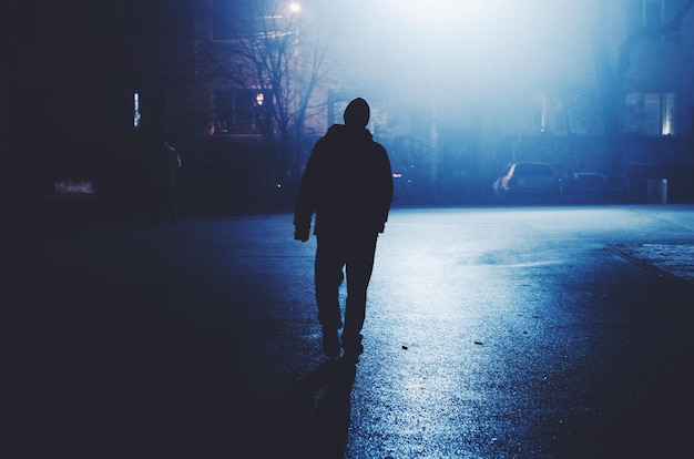 Silhouette of man at night