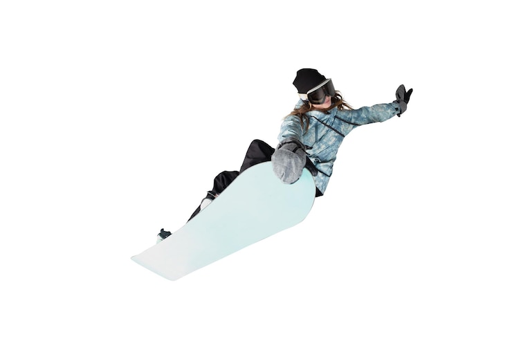 Foto snowboarder girl in action isolated on white