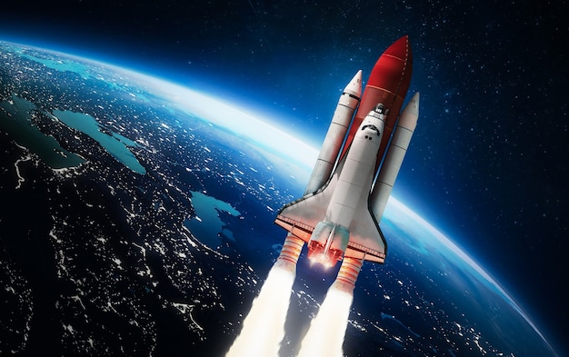 Space shuttle flight from Earth planet Spaceship Elements of this image furnished by NASA