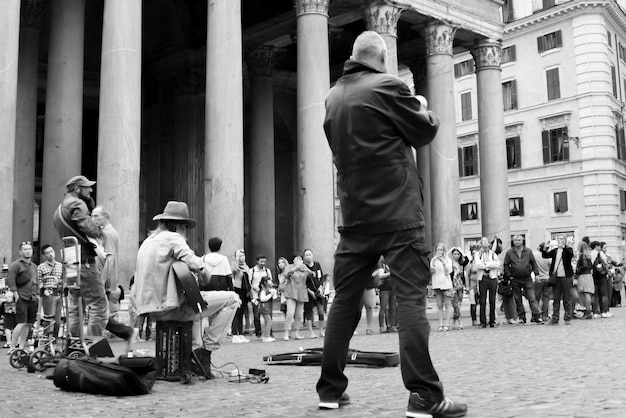 street musicians performing on city street