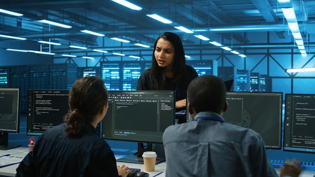 supervisor doing inspection in server hub taking feedback from workers