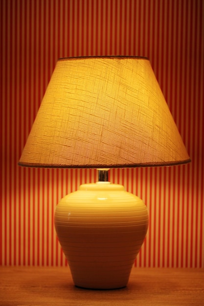 table lamp on wallpaper background