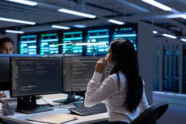 team of specialists in data center call center overseeing hardware