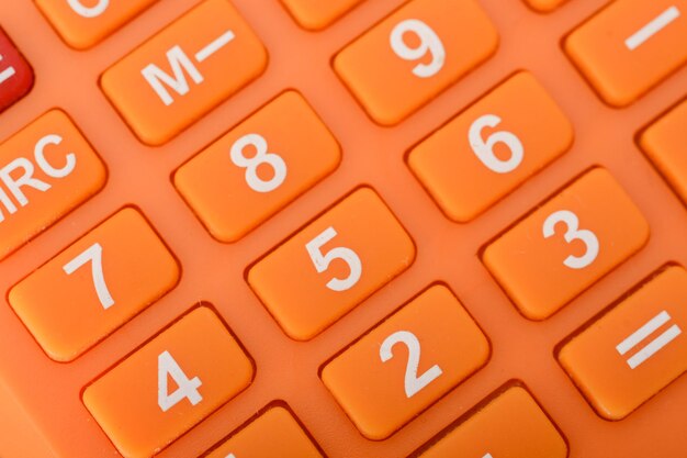 the closeup view of the calculator underscores its relevance to the fields of business and the economy