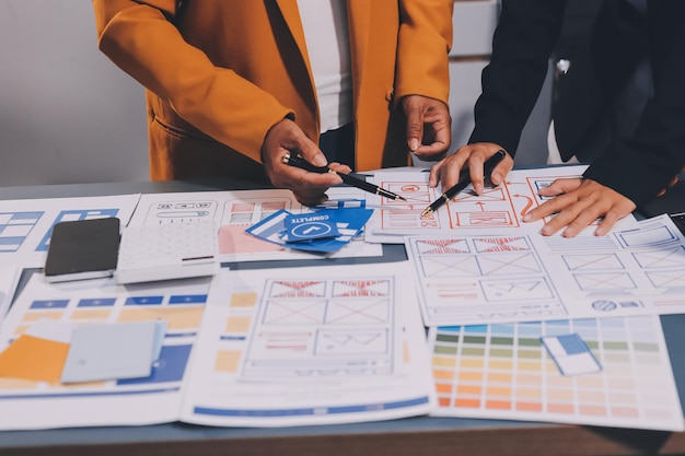 The designer team is designing the uxui system to make the uxui system work well on new phones and support system updates Website development concept UI UX front end designer