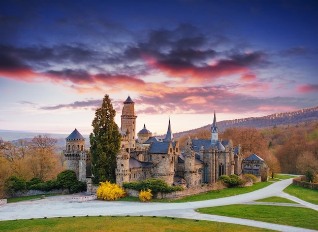 the picturesque sunset and cumulus clouds over the ancient castl