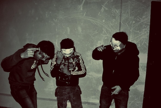 Three men in masks