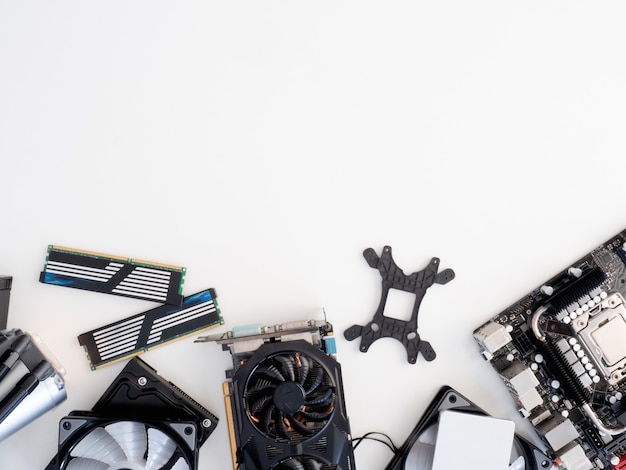 top view of computer parts with harddisk, solid state drive, ram, cpu, graphics card, liquid cooling and motherboard