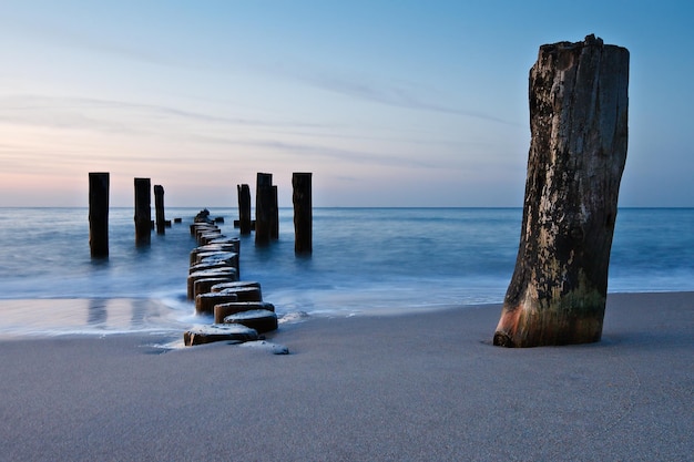 view of jetty at calm sea against the sky