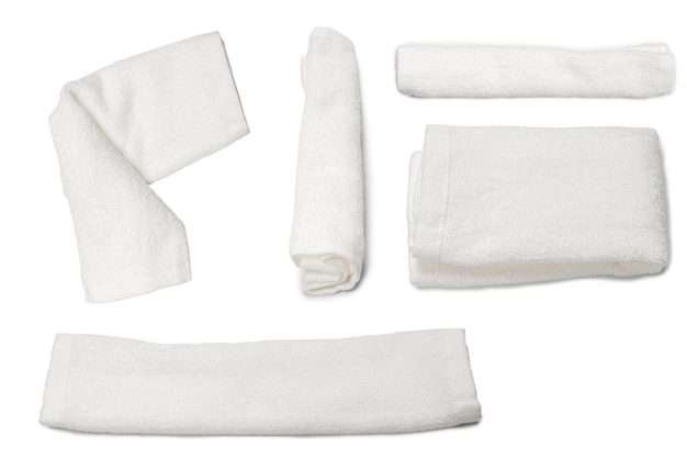 White fluffy cotton towel isolated on a white background