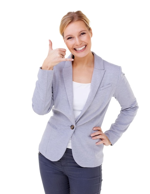 Woman studio and portrait with hand gesture and smile with hand phone confidence and suit Businesswoman telephone and white background for call me hand raised and attitude for contact and wow