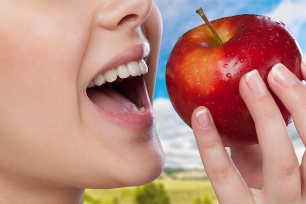 woman with apple