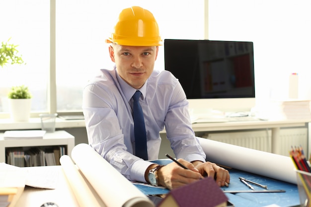 Young Architect Freelance Man Working on Blueprint