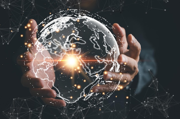 A businessmans hand holds a globe illustrating seamless connectivity and data flow across global network