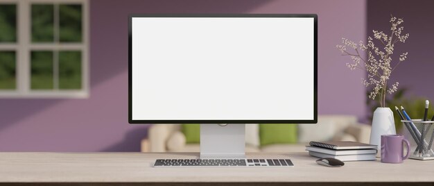 A modern home office with a whitescreen computer mockup in a modern colorful living room