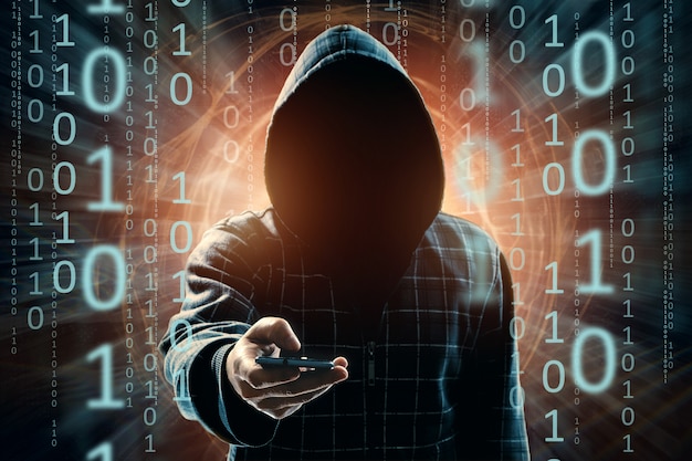 A young hacker in a hood hacks a smartphone, a hacker attack, a silhouette of a man, mixed media
