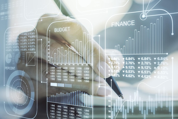 abstract creative analytics data spreadsheet with woman hand writing in diary on background analytics and analysis concept multiexposure
