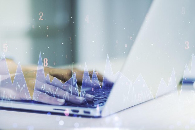 abstract creative stats data concept with hands typing on laptop on background multiexposure