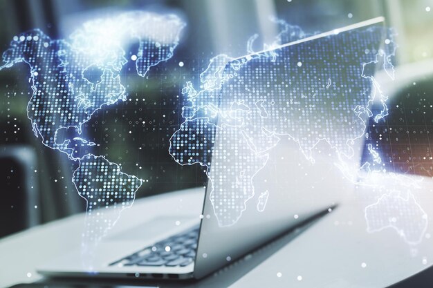 Abstract creative world map on modern laptop background international trading concept Multiexposure