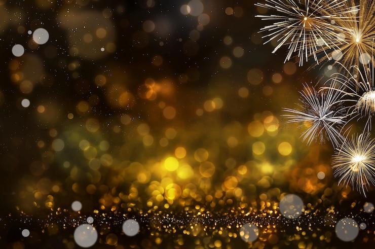 Bild abstract golden glitter and bokeh light background with fireworks