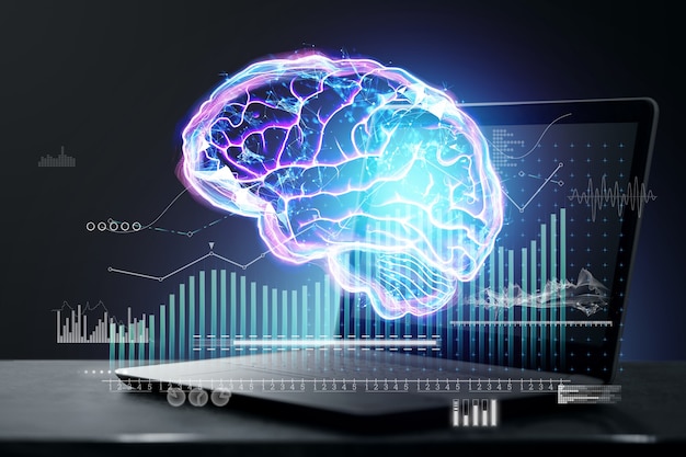 Abstract hologram of the brain with analytical information on the background of a laptop. Concept for innovation and brainstorming, technology, future. Double exposure.