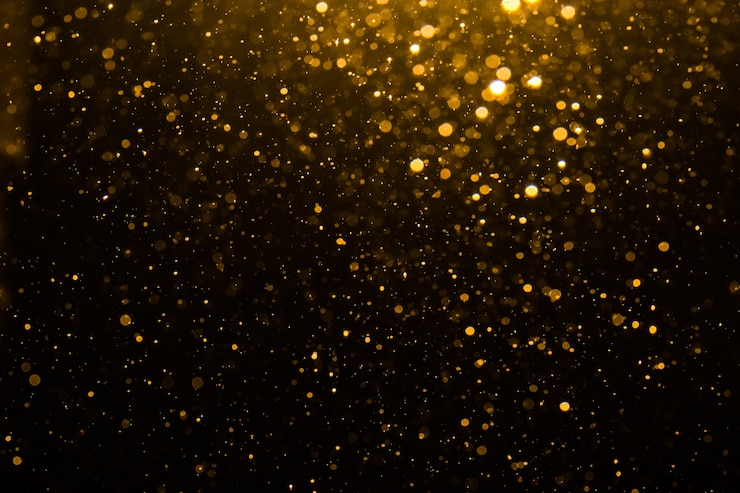 Bild abstrakt guld-bokeh med svart bakgrund
