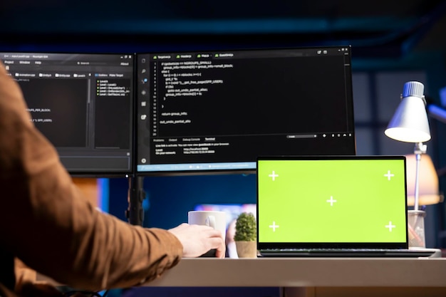 Admin using green screen laptop to filter malicious traffic