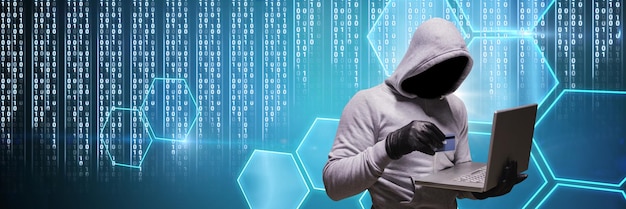 anonymous hacker with computer code binary interface