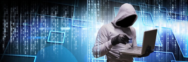 Anonymous hacker with computer code binary interface